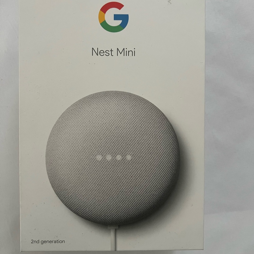 Google Assistant Device Packaging with Blue and White